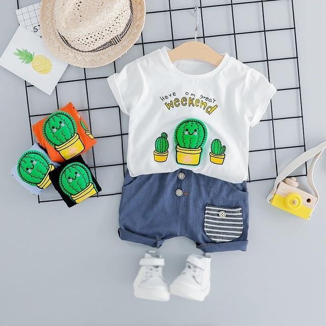 White baby summer outfit with cute smiling cactus print, short sleeve for boys and girls.