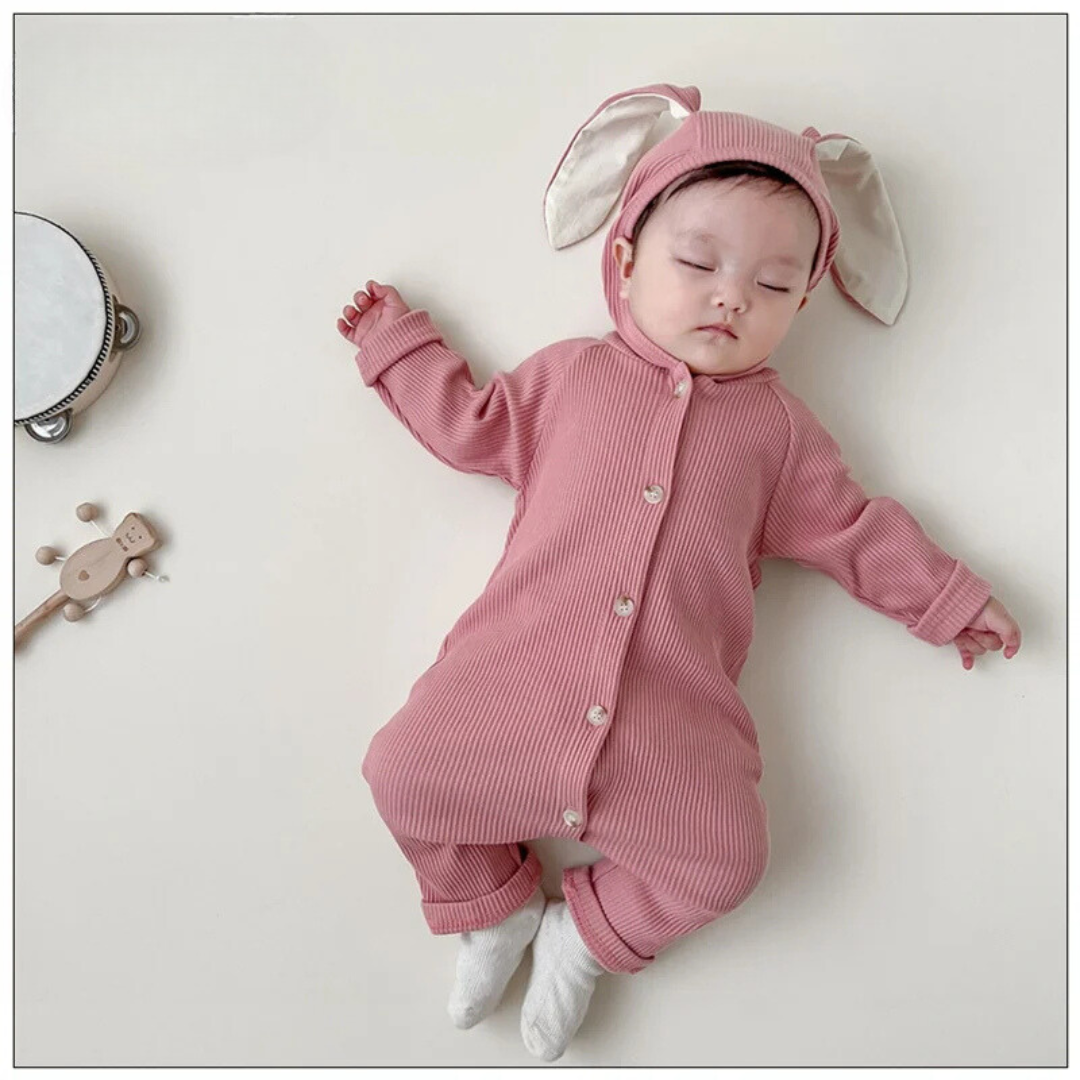 Close-up of the rabbit design on a soft cotton baby jumpsuit, perfect for infant comfort.