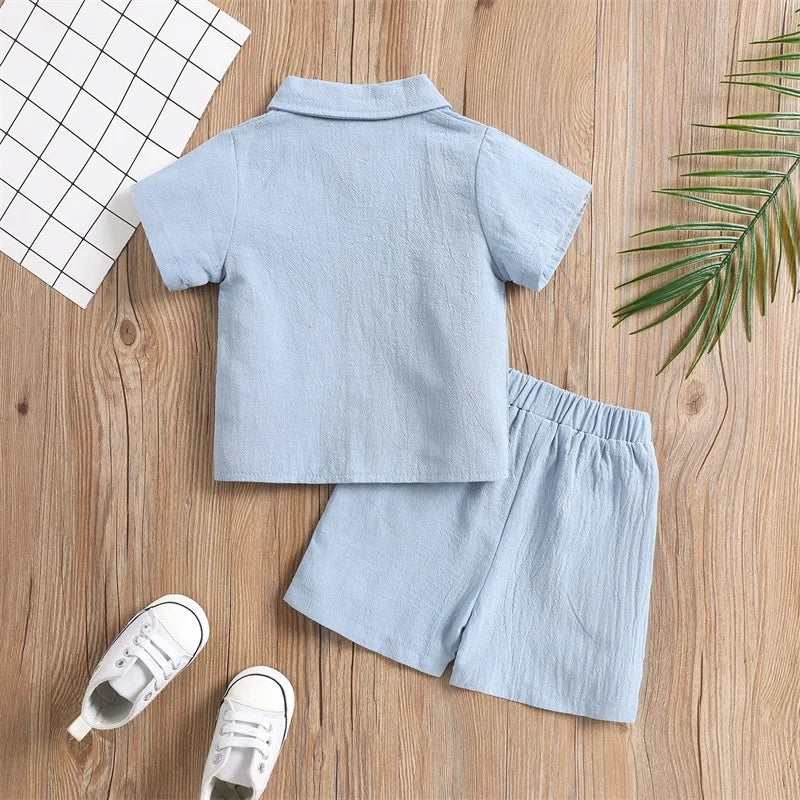 Versatile baby outfit: two-piece cotton shirt and pant set, ideal for summer or spring comfort.