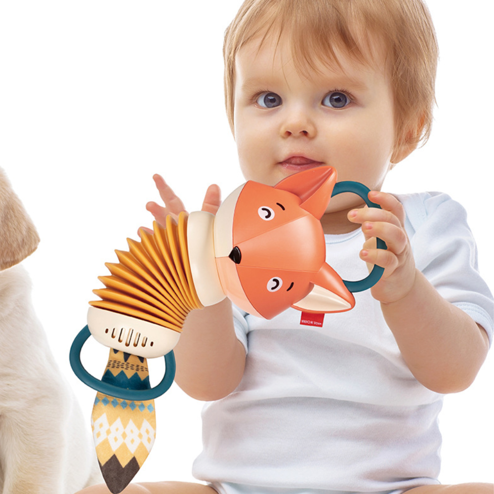 Bright orange fox themed musical accordion rattle, a perfect early learning toy for babies and kids music.
