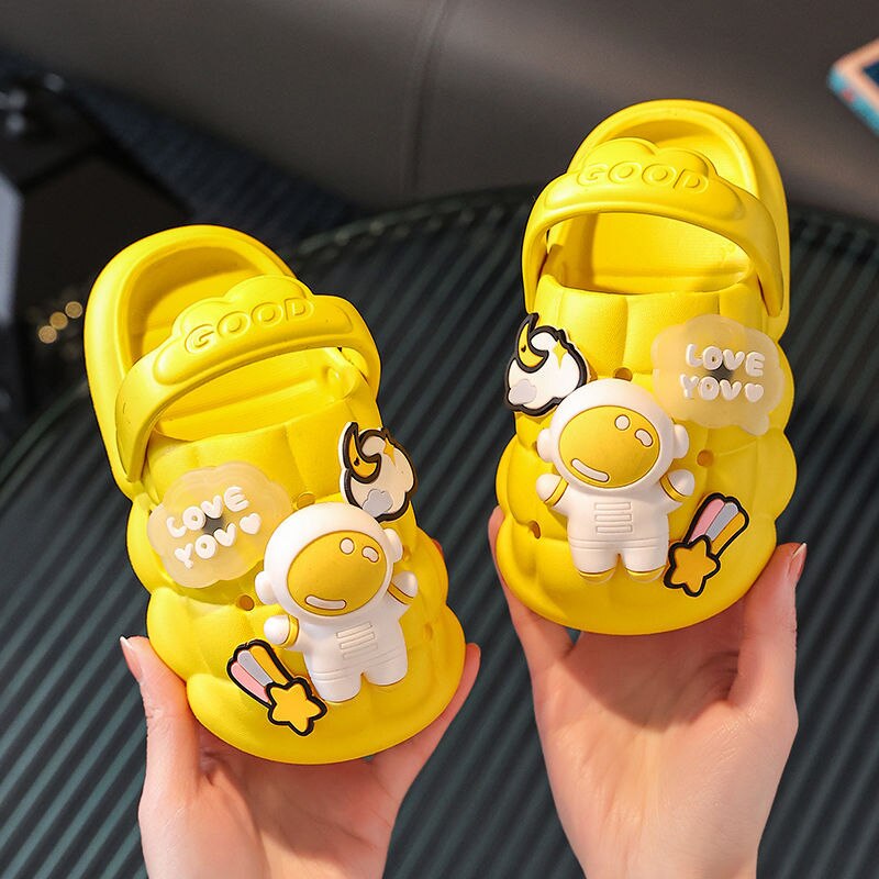 Stack of anti-slip kids' sandals in various colors, showcasing summer footwear range.