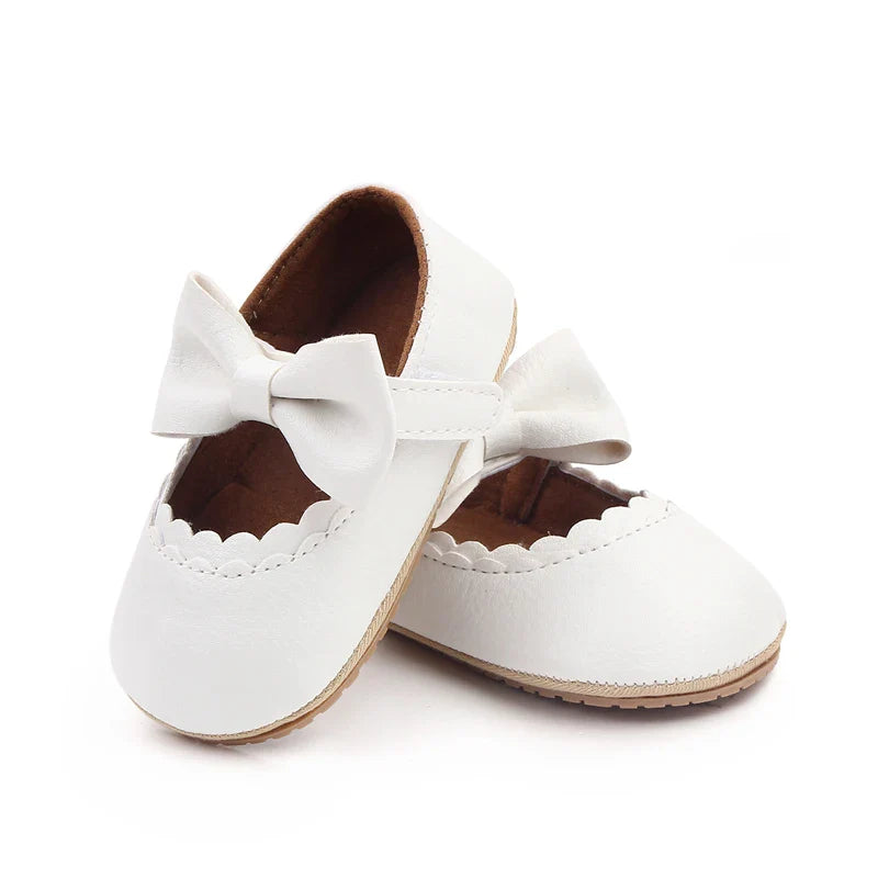 Soft sole anti-slip bowknot prewalker shoes for newborn and infant girls.