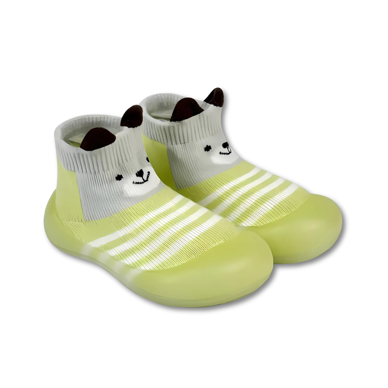 Close-up of the anti-slip sole on a baby animal slipper sock, showing enhanced grip for confident first steps.