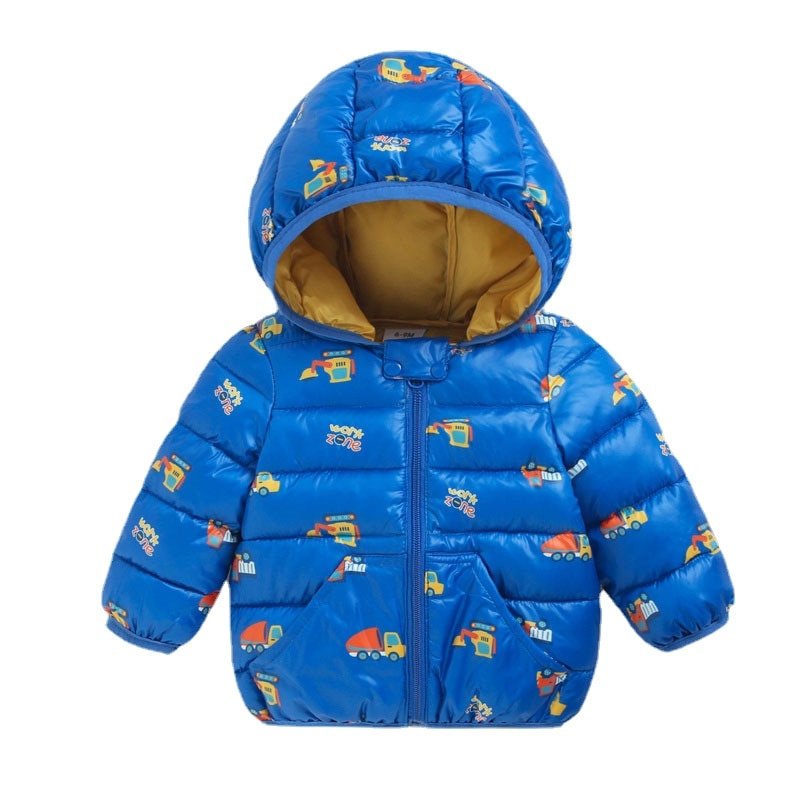 Lifestyle shot of a baby playing in an elephant winter parka jacket, cozy and warm for outdoor fun