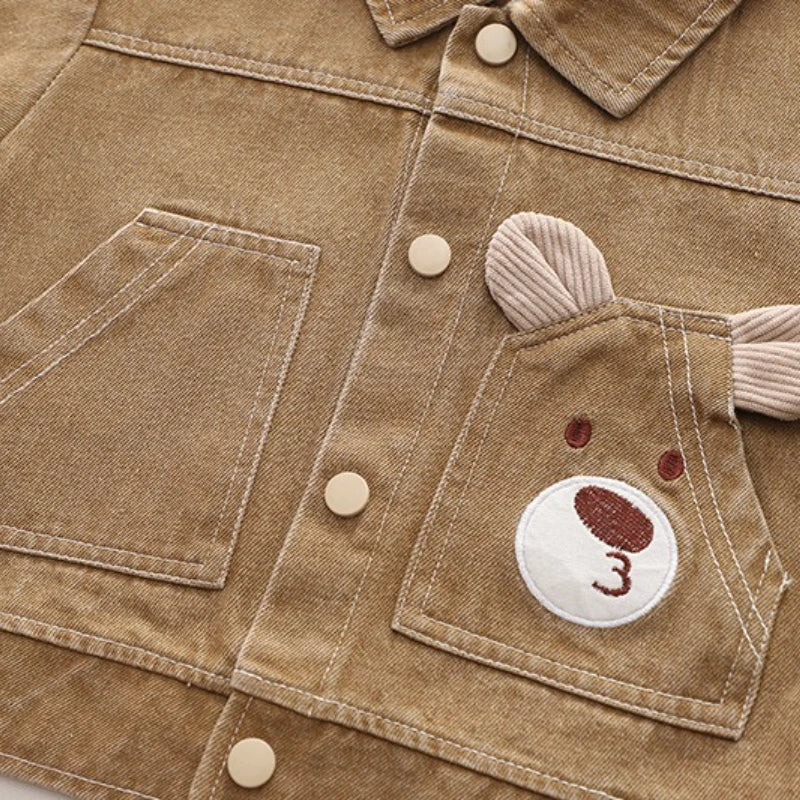 Display of three pastel cotton outfits for babies, autumn winter fashion collection