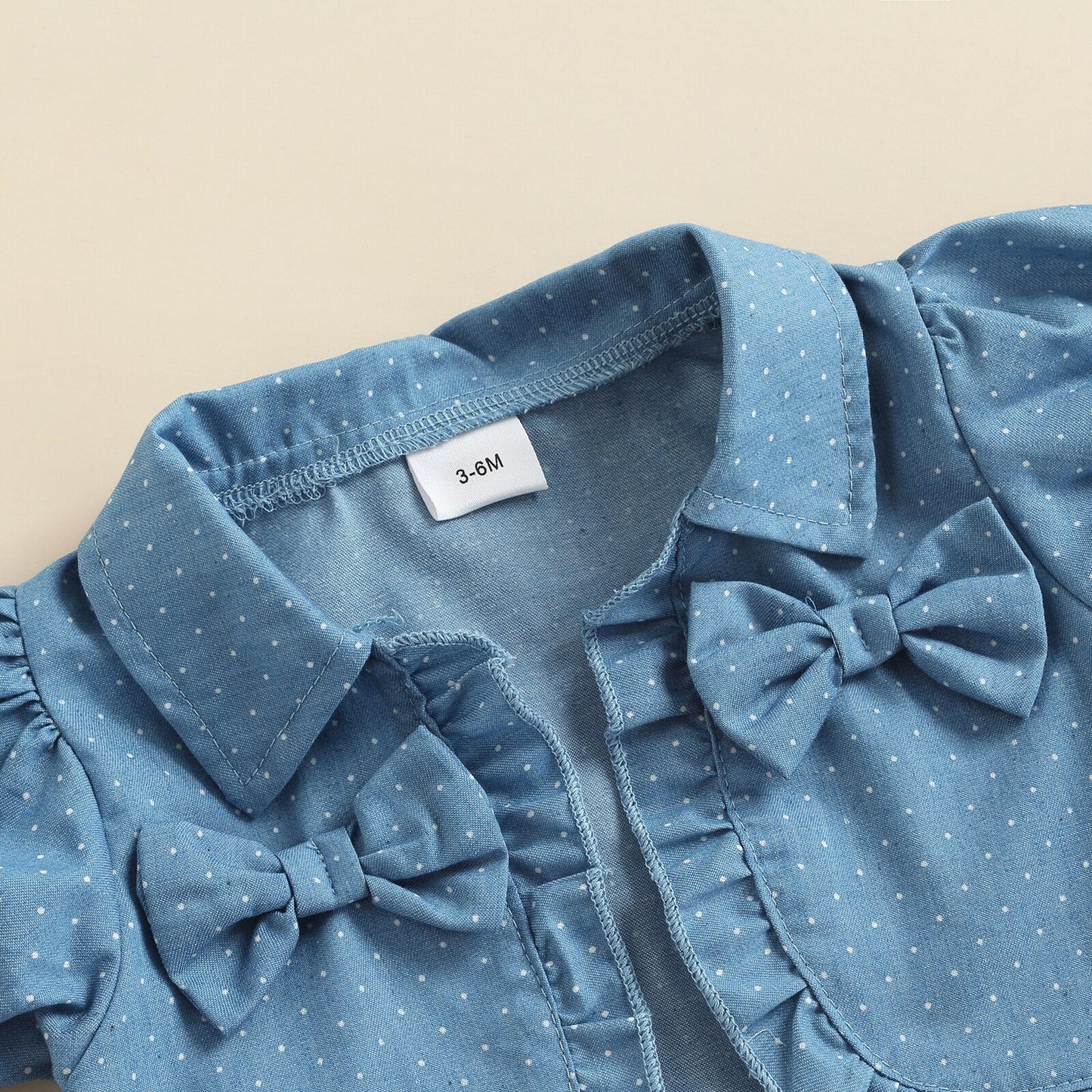 Infant girl's fashionable summer ensemble with a hearts & dots tulle dress and denim jacket