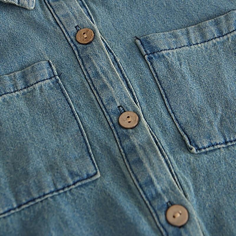 Adorable toddler girl wearing a comfortable denim baby romper, a great outfit for infants.