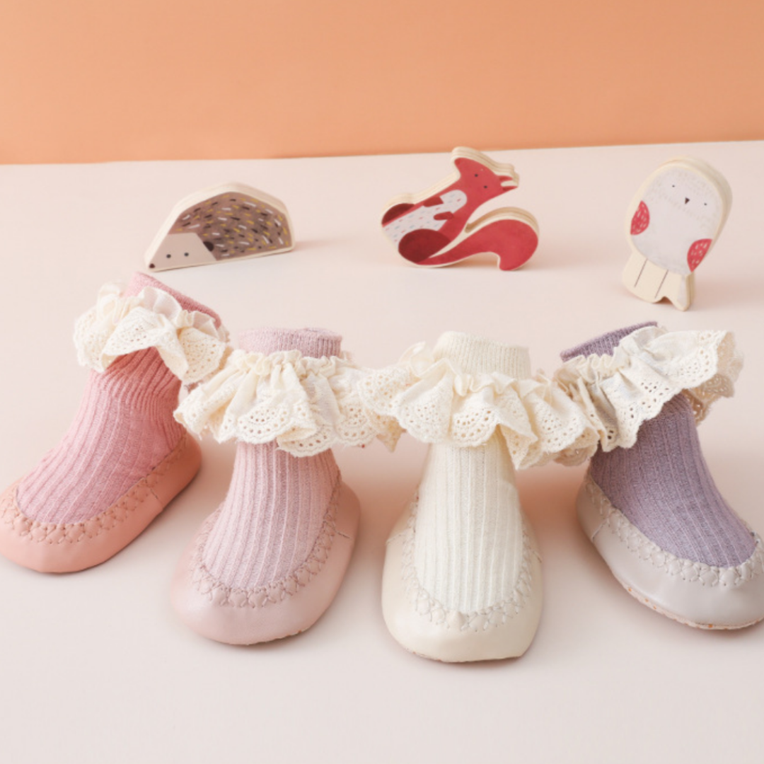 Light pink baby girl cotton socks with anti-slip sole and elegant lace, walker shoes.