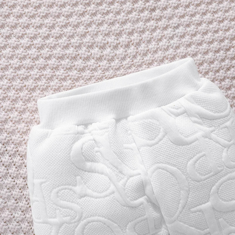 Baby two-piece loungewear featuring a long-sleeve tee and comfortable elasticated pants