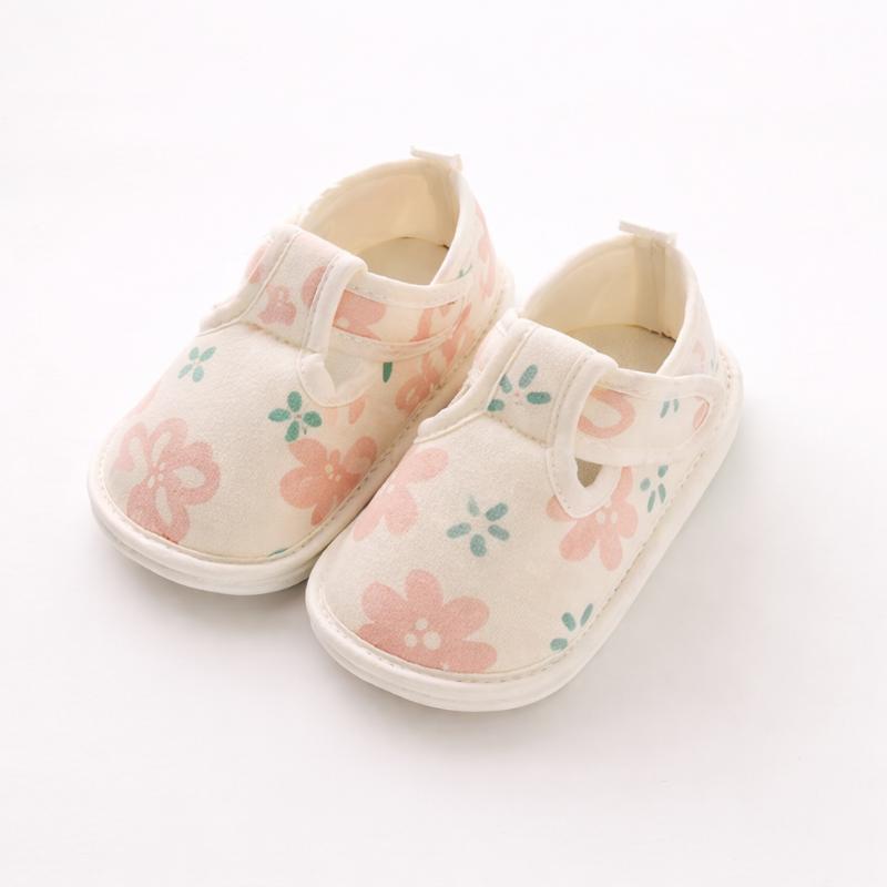 Comfortable cotton first walker shoes for baby, designed with a soft grip and slip-resistant features for early steps.