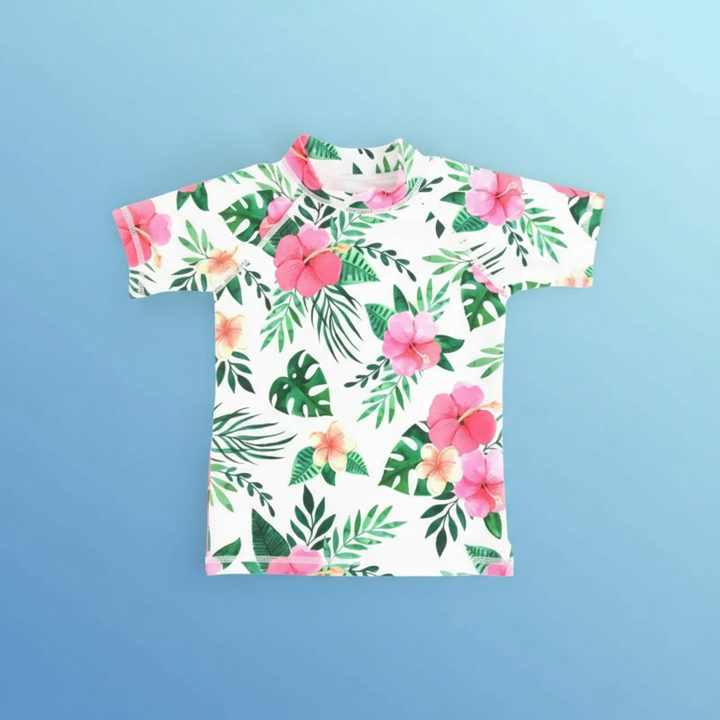 Smiling child in a colorful anti-UV swim shirt, protected and happy during sun exposure.