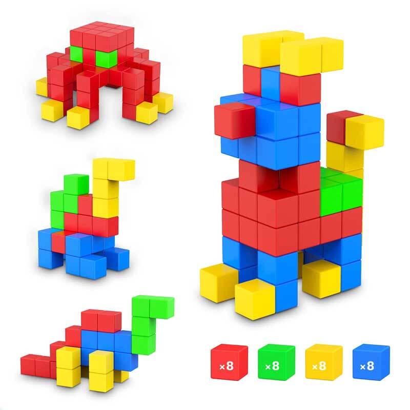 Vibrant magnetic cube blocks scattered on a play mat, ready for creative building and kids' activity