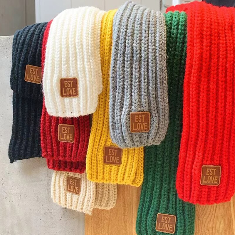Colorful knit tube scarf for toddlers, a soft and warm winter accessory for boys and girls.