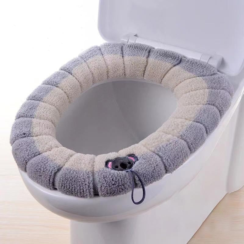 Ergonomic comfort toilet seat cushion with easy-grip handle, potty training aid