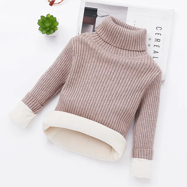 Profile view of a kids' padded turtleneck, showcasing the high neck for extra winter protection.