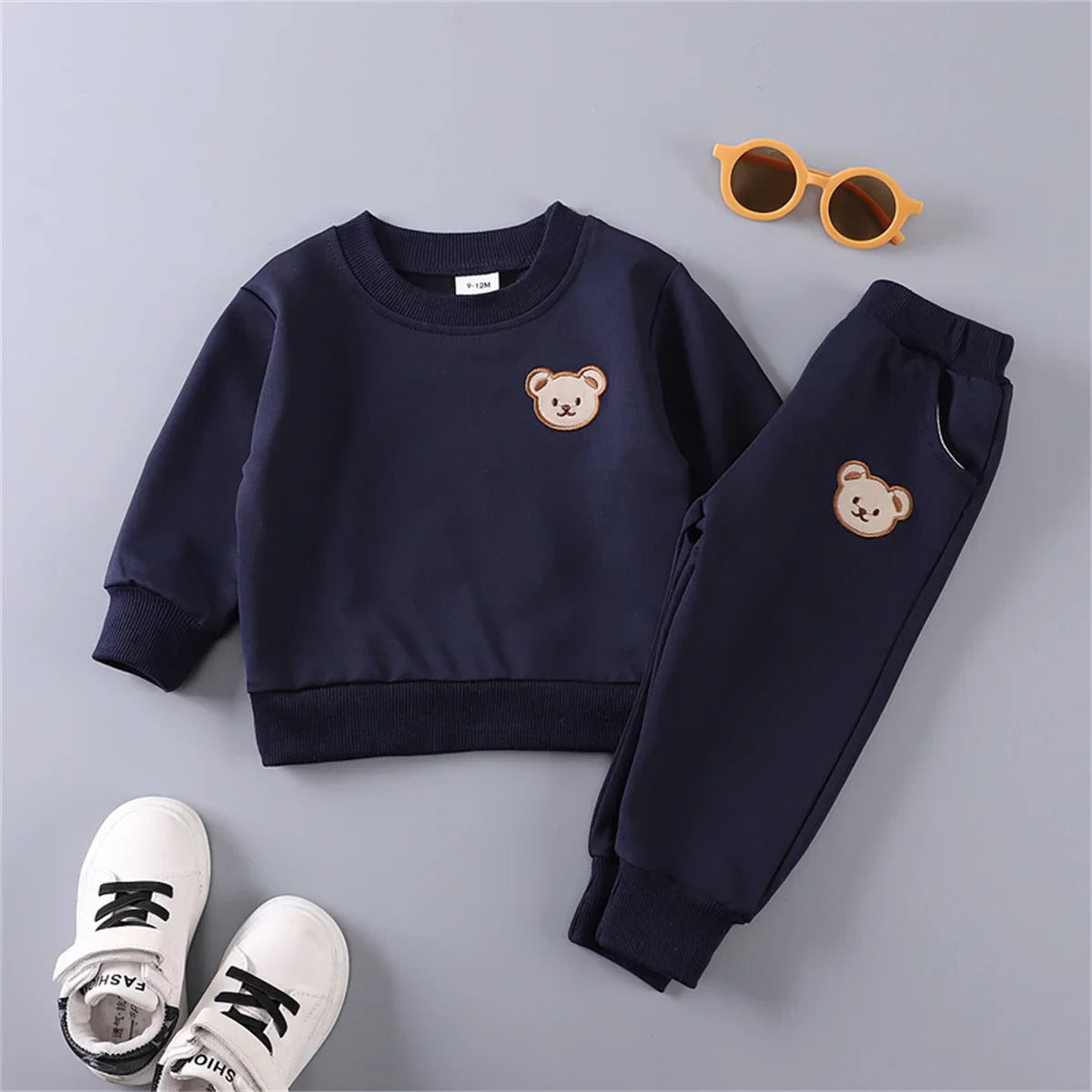 Comfortable cotton loungewear for baby, featuring a cute bear design.