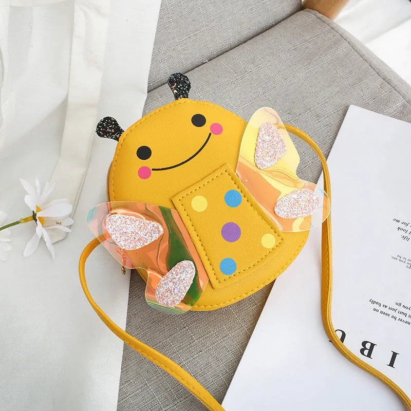 Chic kids' cartoon bug crossbody bag, durable PU leather construction, a delightful gift for young children.