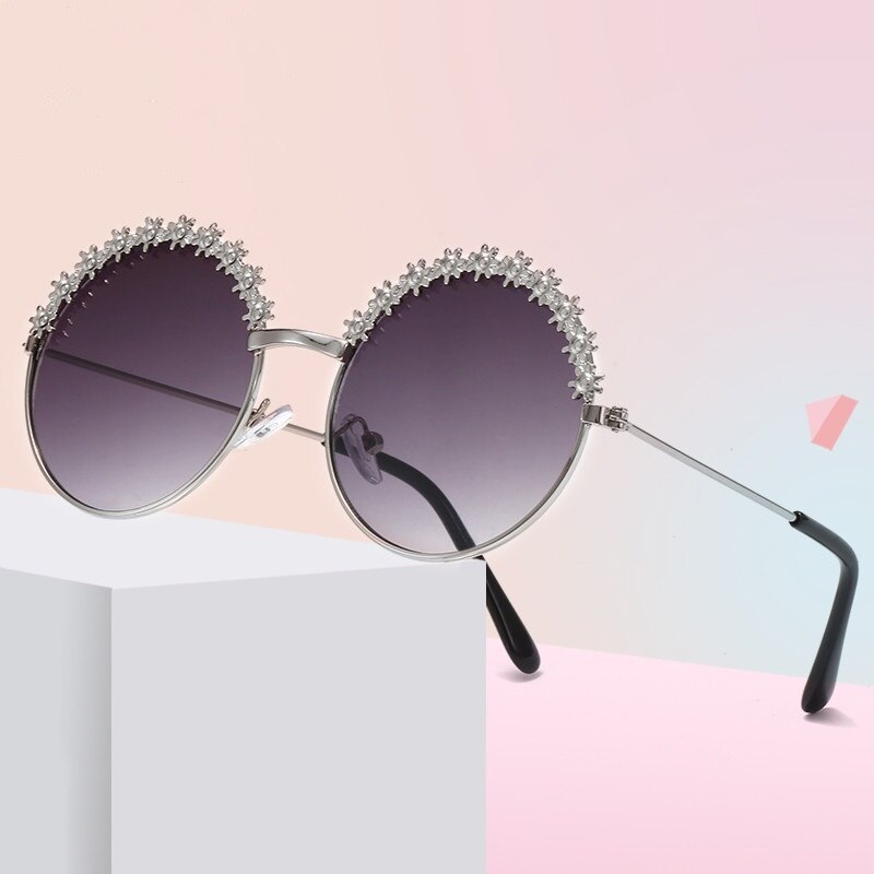 Collection of colorful UV protection kids sunglasses, perfect for summer outdoor play