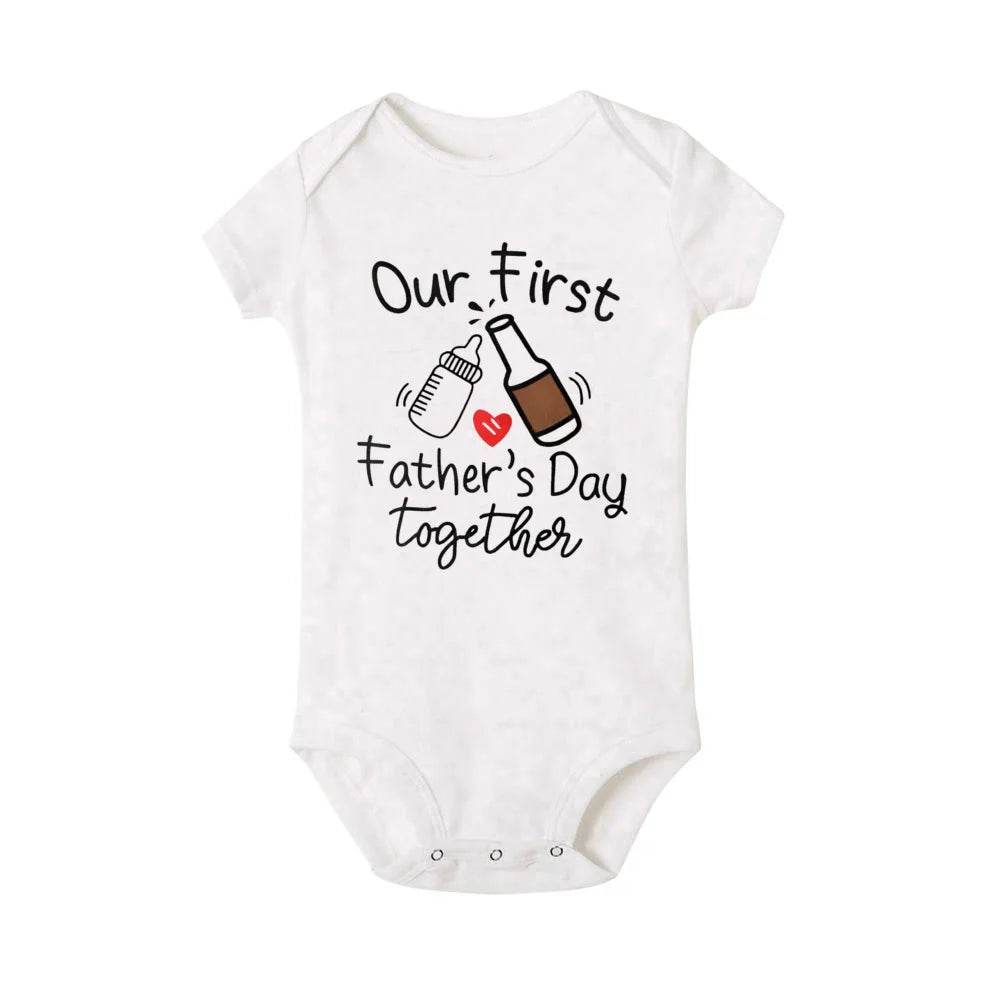Baby's 'My First Father's Day' romper with envelope neck for easy changing. New dad gift.