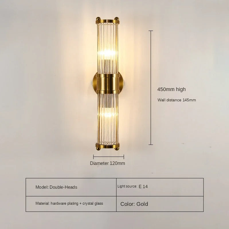 Elegant cylindrical glass wall sconce with chrome finish, crystal accents, electroplated hardware. Ideal for modern interiors
