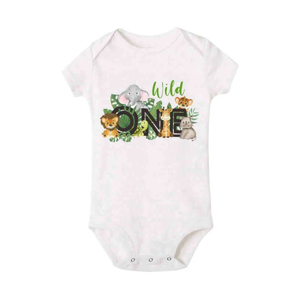 Family enjoying summer in matching wild graphic t-shirts and a cute baby romper.