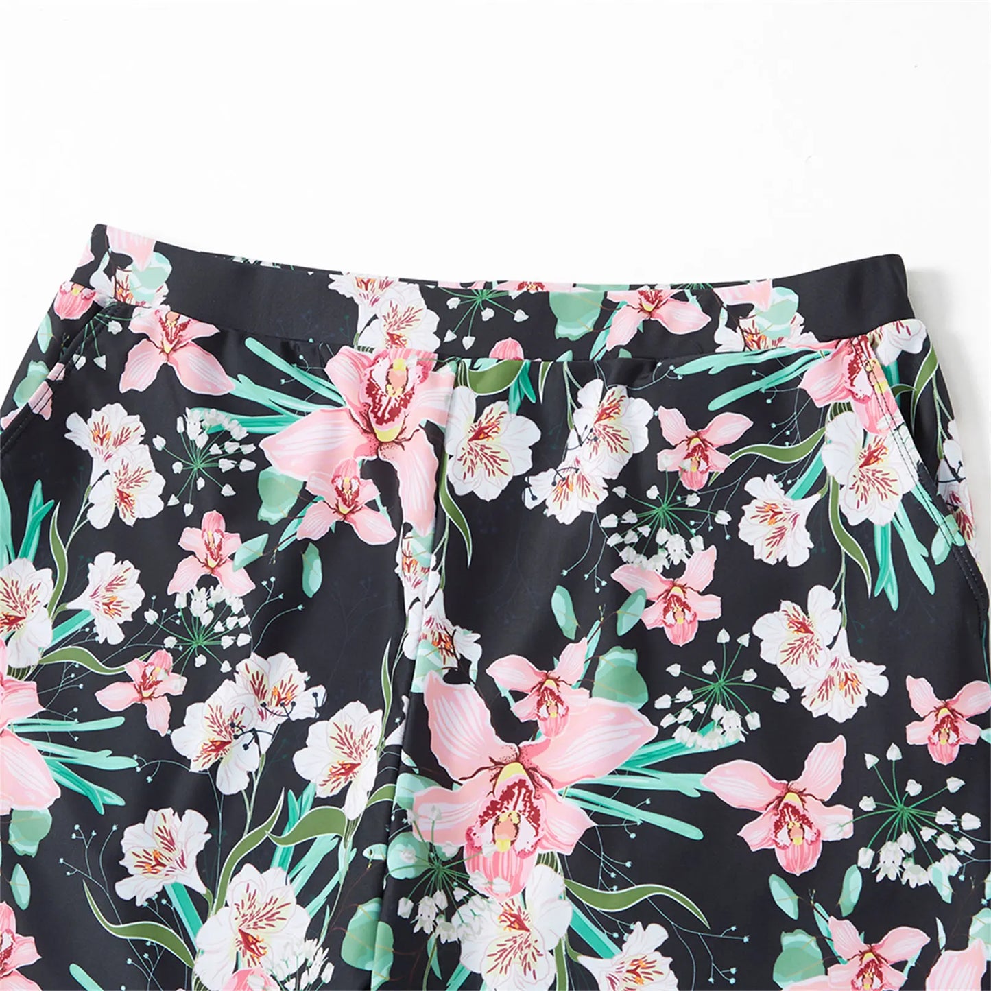 Matching floral one-piece swimsuit, ideal family swimwear for summer pool parties and beach.
