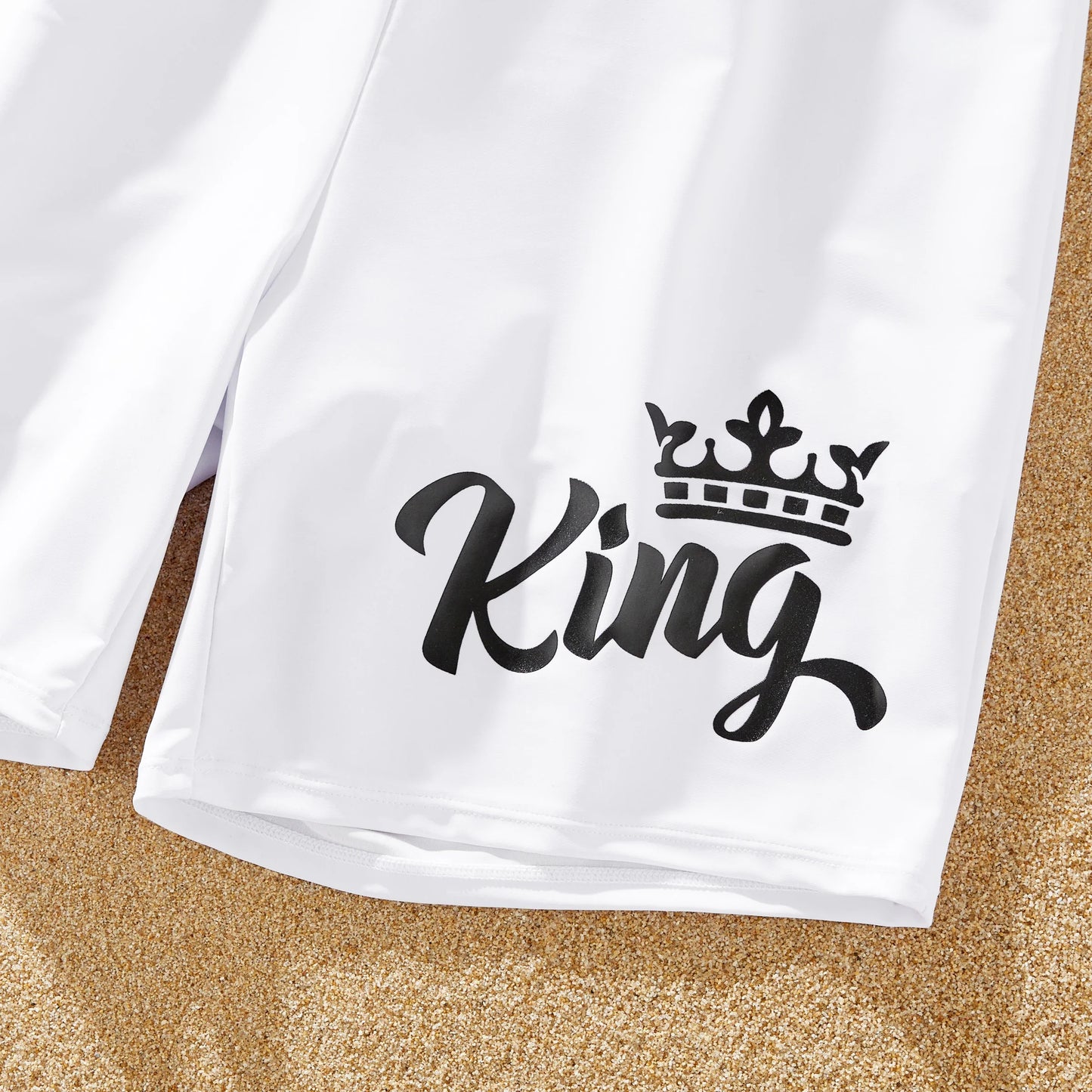White family swim set: bow swimsuit for girls and women, drawstring trunks for boys and men.