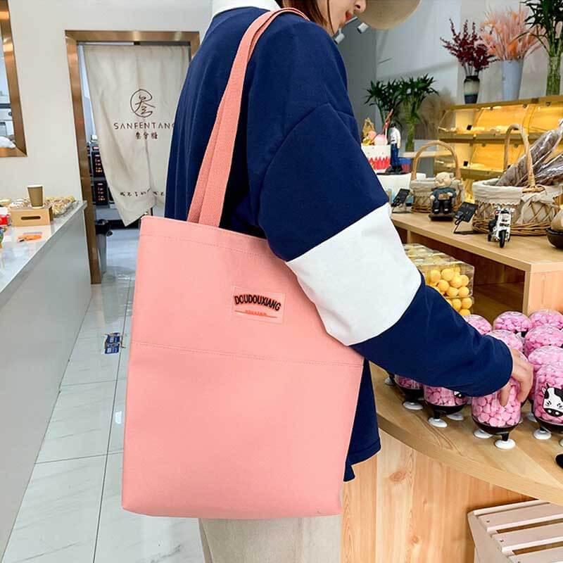 Stylish girls' 4-piece school backpack set including a large school bag, matching tote, messenger bag, and pencil case.