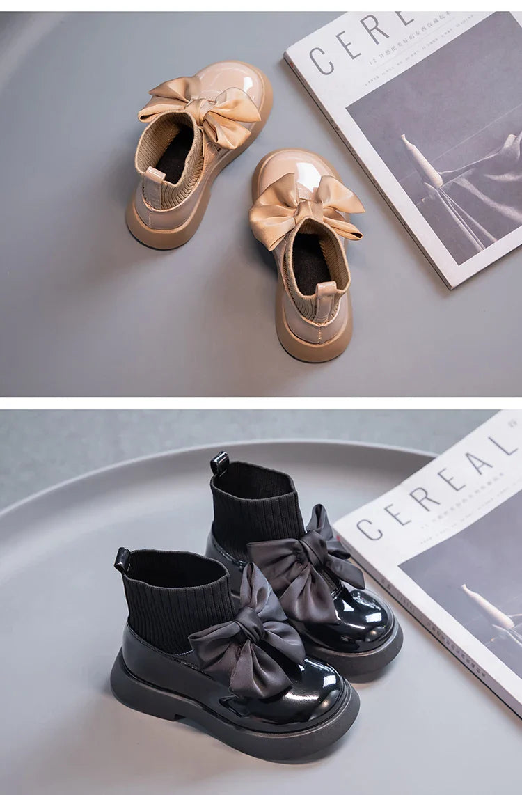 Fashionable non-slip toddler boots, elegant ankle style for school or play.