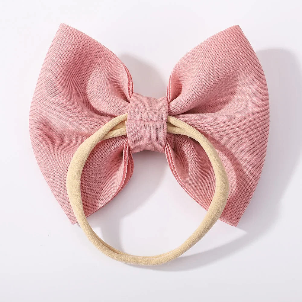 Complete kids' summer look: girls' cool sunglasses and a cute fabric bow headband