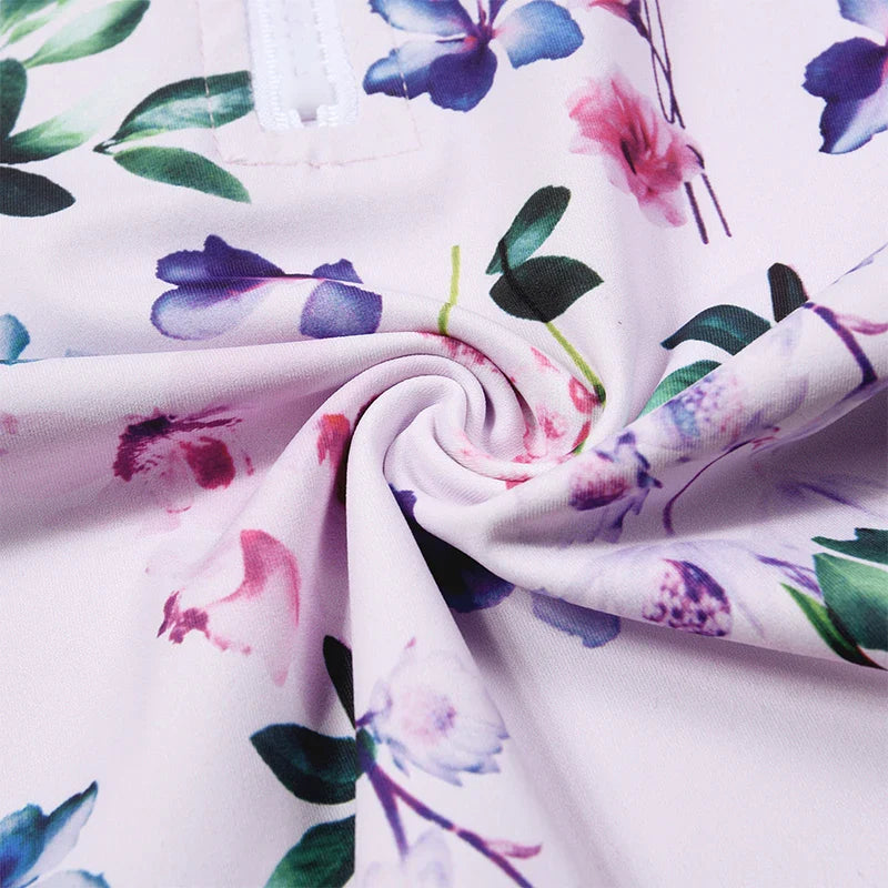 Girls' long sleeve UV protect swimsuit, a stylish printed option for ultimate sun protection.