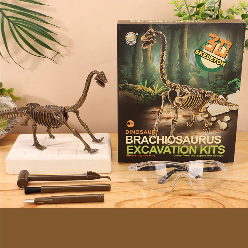 Child using a brush and chisel to uncover a dinosaur bone in their excavation kit
