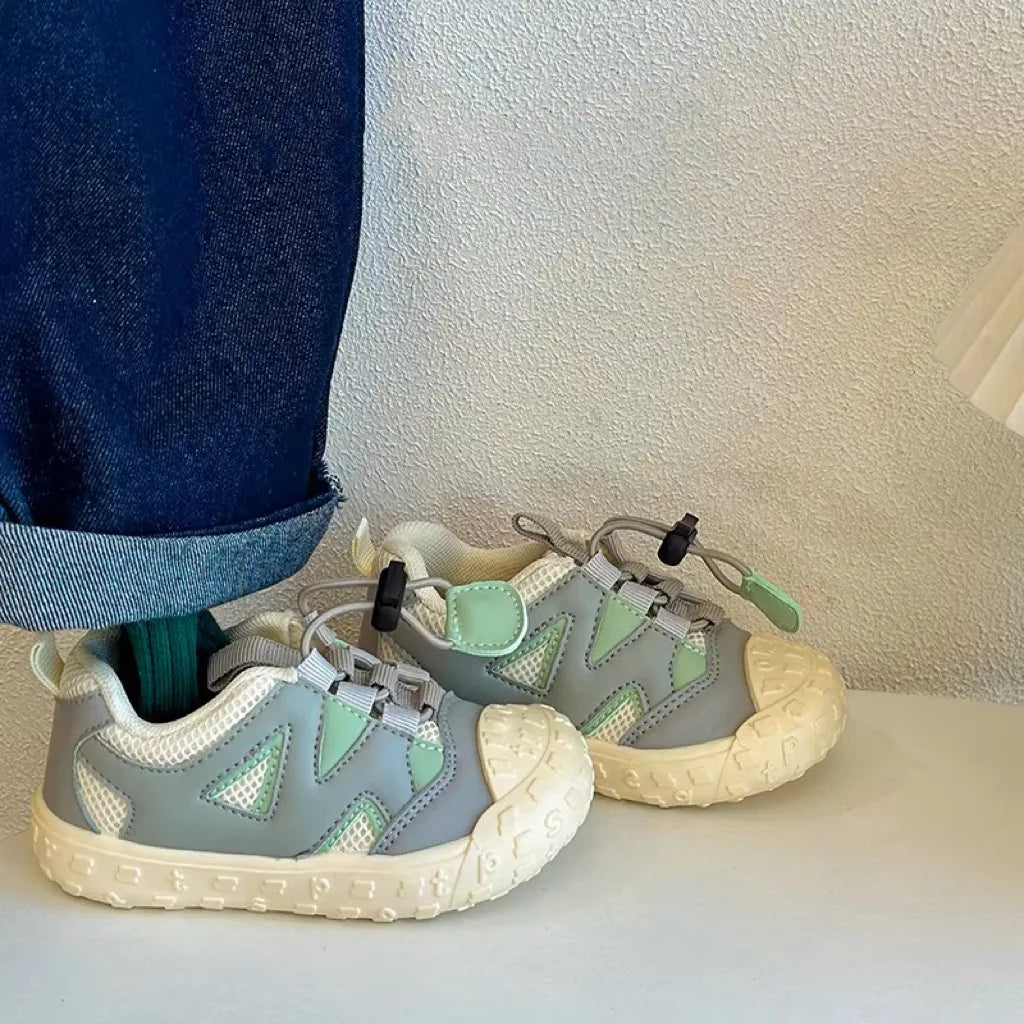 Lightweight pink kids' active footwear, breathable mesh toddler shoes with convenient hook and loop.