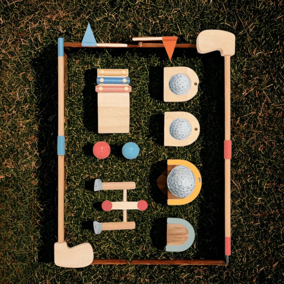 Kids mini golf set with durable wooden clubs and brightly colored balls, great for outdoor and indoor games