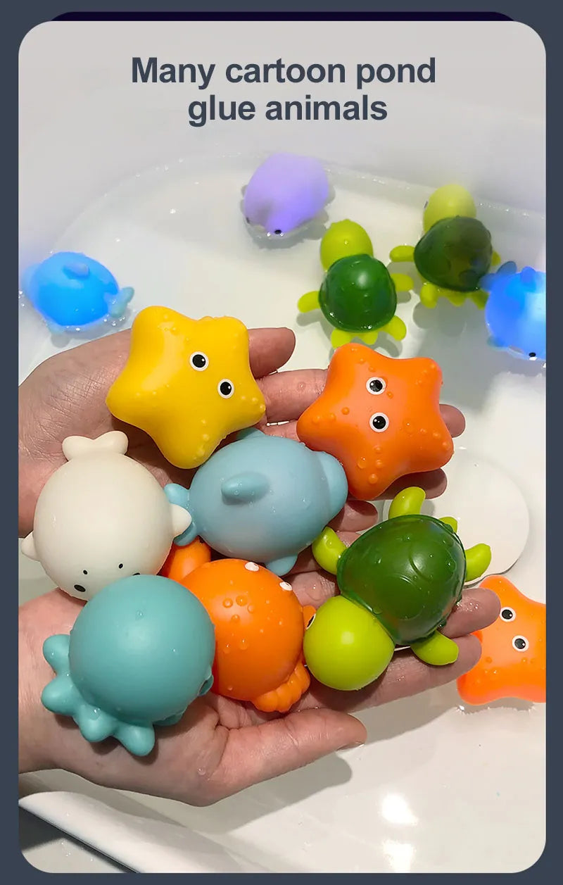 Bathtub with a happy baby surrounded by glowing animal bath toys