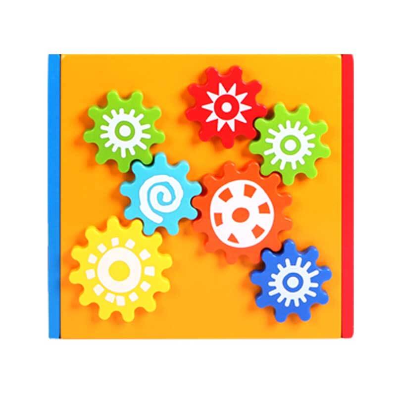 Montessori wooden activity cube with a child's hand moving a wooden bead, emphasizing sensory and motor skill play