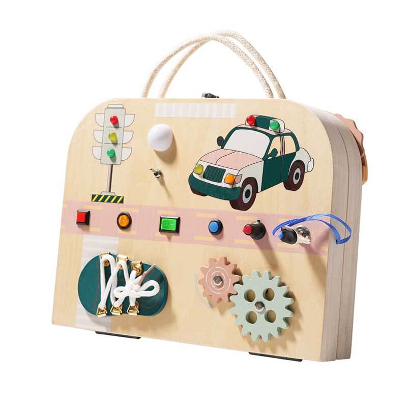 Close-up of a busy board showing a zipper, buckle, and shoelace, perfect for toddler fine motor learning.
