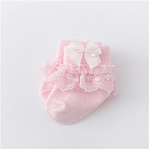 White baby girl's lace socks with princess bow, comfortable cotton blend for newborns