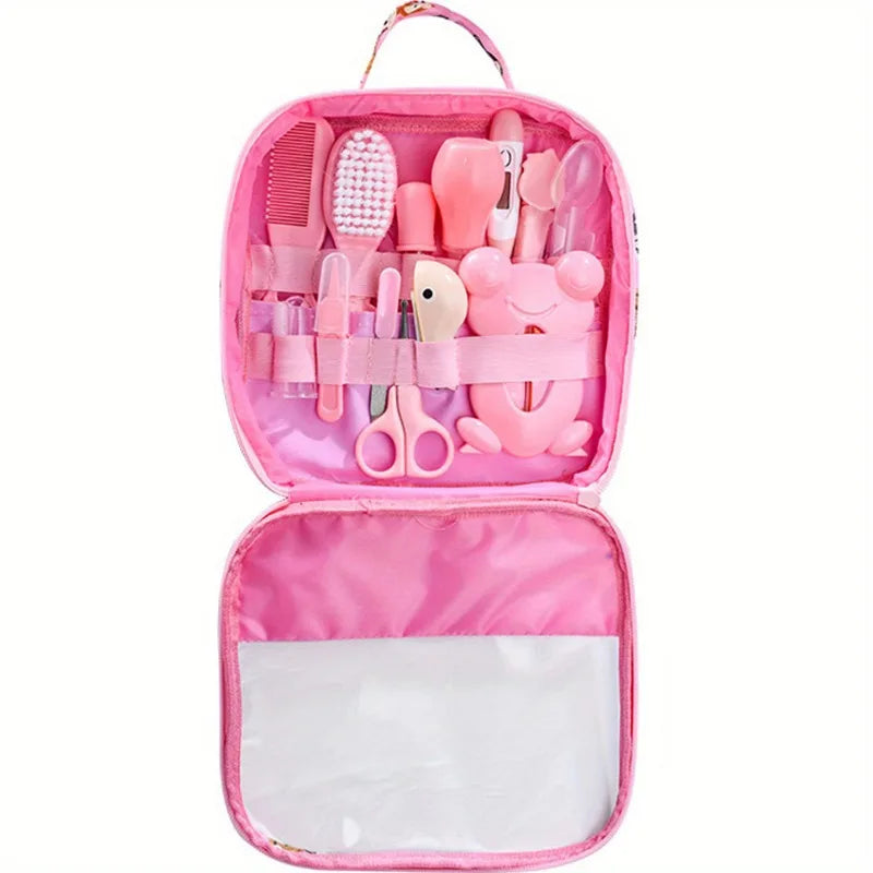 Pink baby grooming kit, perfect for a baby girl, with all health and hygiene tools.