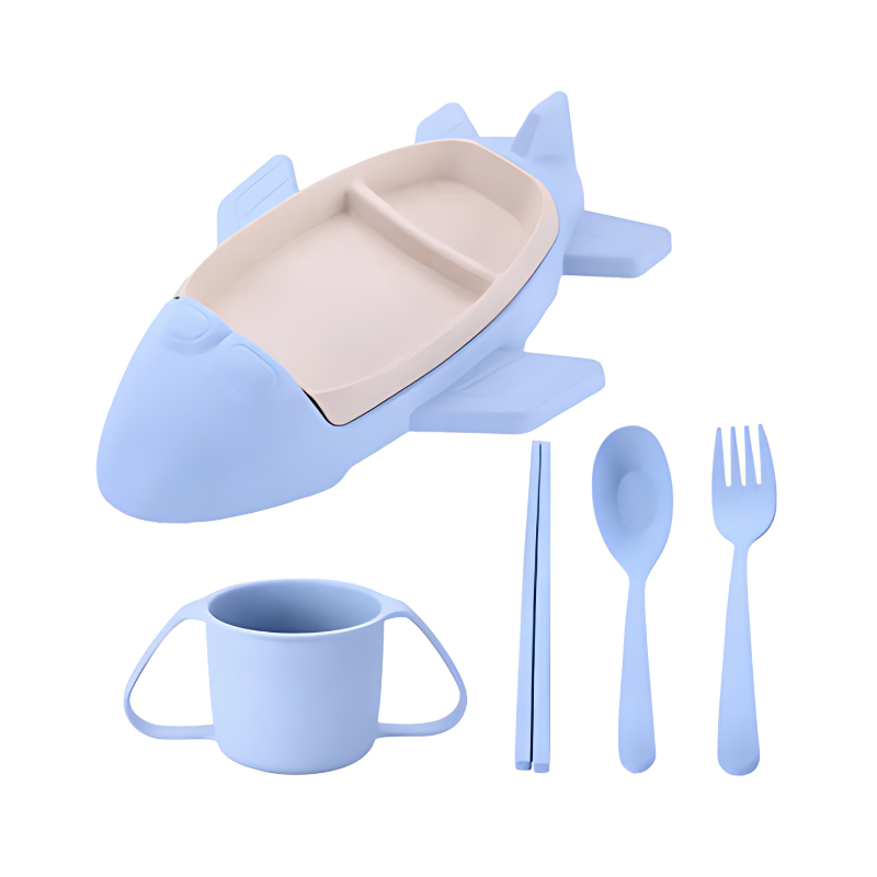 Ergonomic divided plate for kids, plane-shaped in green, designed for small hands and easy scooping.