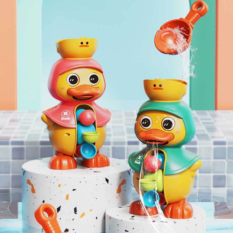 Packaging for the interactive duck bath toy, showing pink and green options for babies