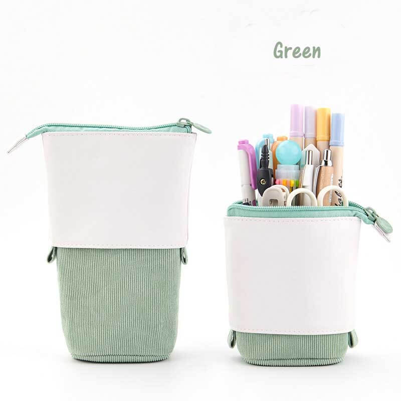 Pop-up pencil case in pastel corduroy, features robust vegan leather base for durability.