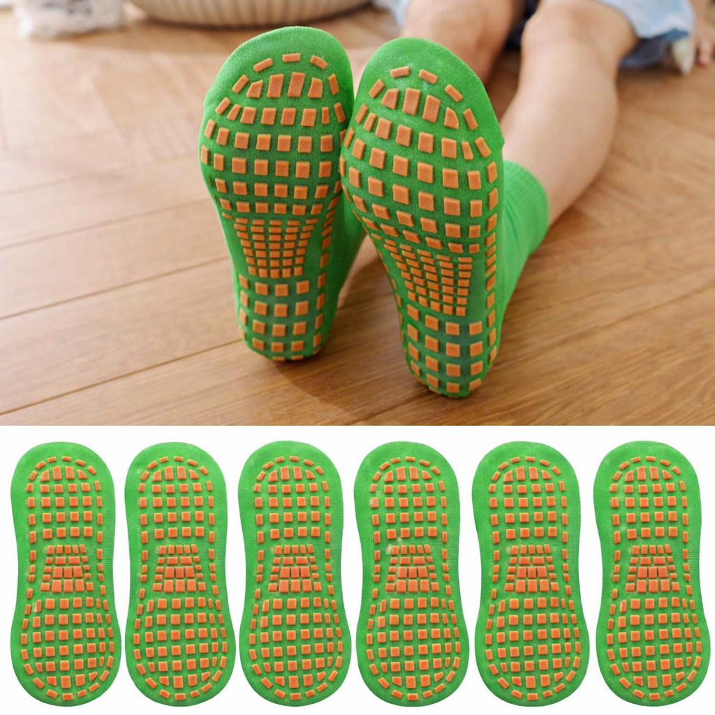 Cut-out image of a single anti-slip trampoline sock showcasing its specialized grip pattern and cotton fabric.