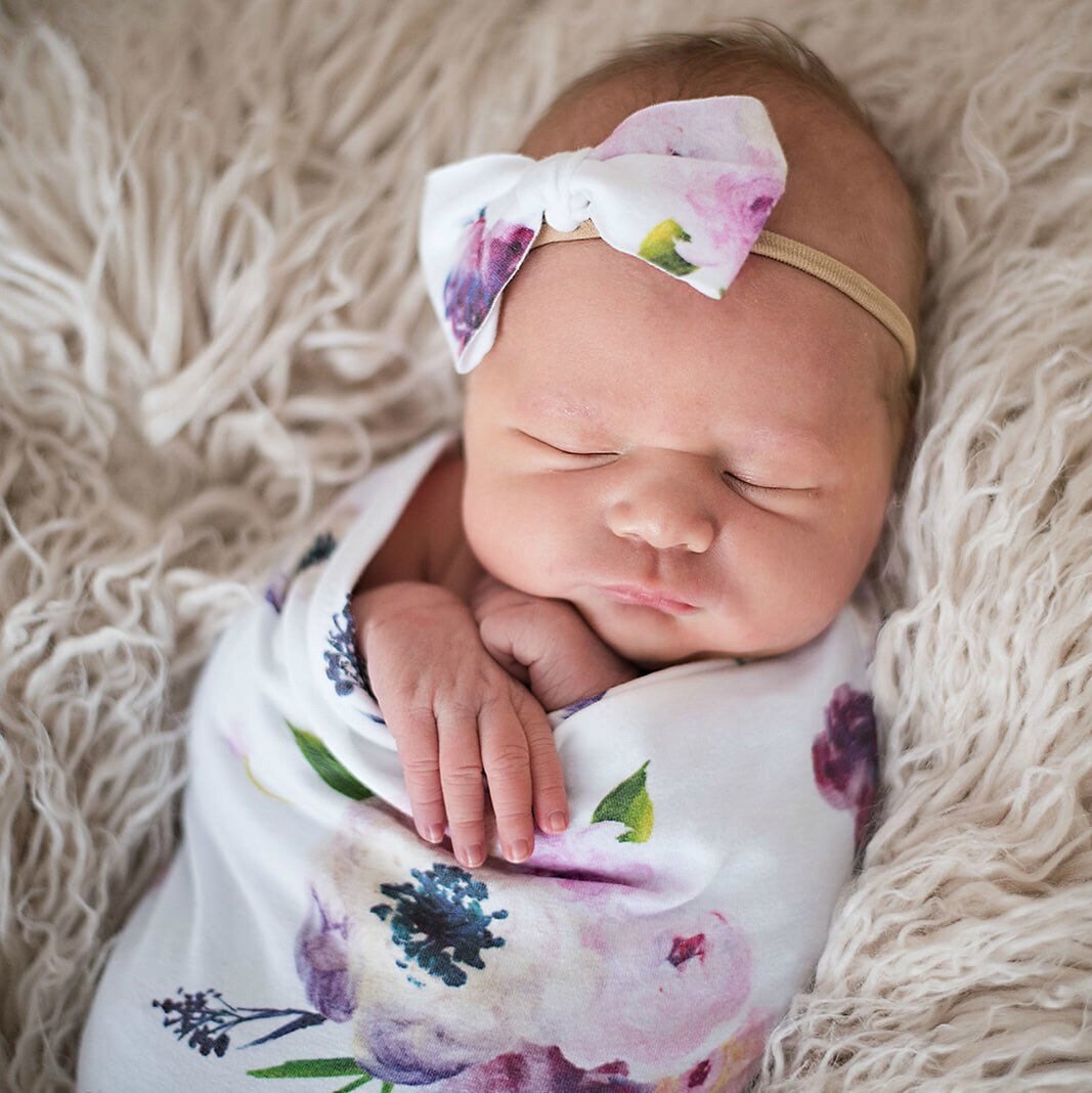 Organic newborn swaddle wrap and baby beanie, promoting healthy sleep for newborns
