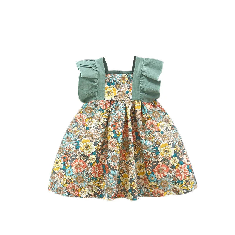 Cute girls' floral print summer dress made of soft cotton with a matching wide-brim hat.