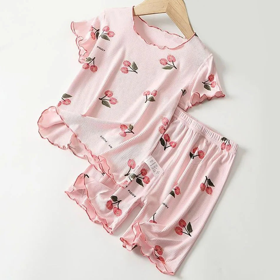 Comfortable modal cotton girls' sleepwear with vibrant cherry print, a cute and breathable summer pajama set