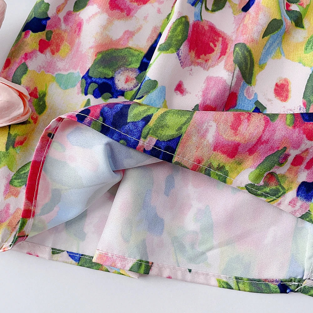 Vibrant floral print ruffle dress for toddlers, a charming summer dress and vacation outfit for girls.