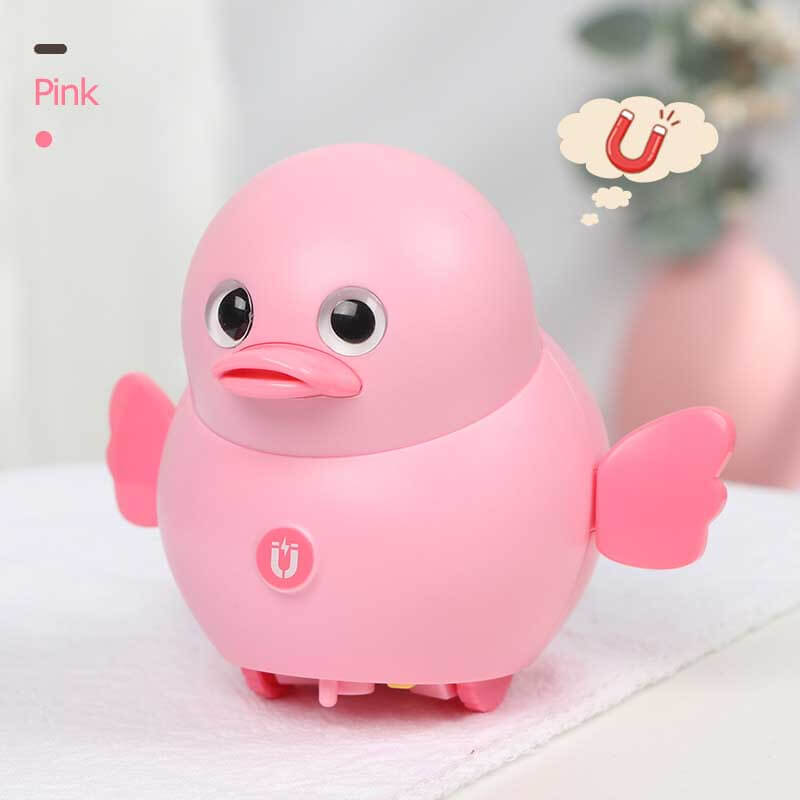 Magnetic interactive duck toy on a colorful playmat, engaging a child in fun learning.