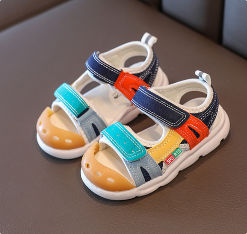 Side view of pink kids' summer sandals, durable and perfect for beach adventures