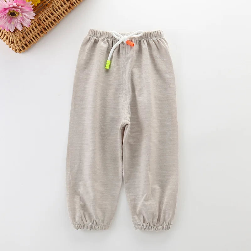Unisex baby cotton breathable summer pants, heather grey, paired with a colorful top, cute outfit